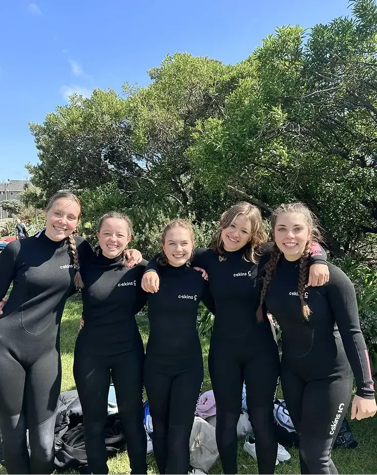 Foto de grupo con deportes acuáticos en Nueva Zelanda