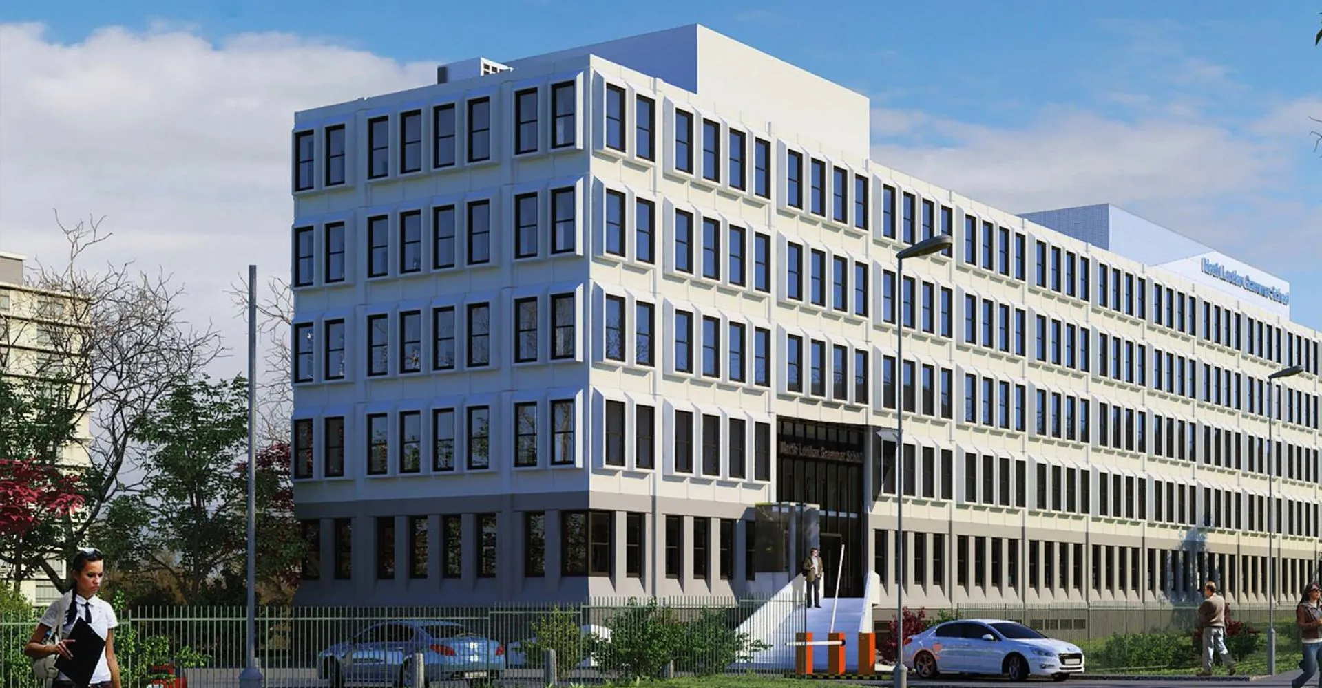 L'edificio scolastico moderno a più piani della North London Grammar School si trova in un contesto urbano con alberi ed edifici circostanti.